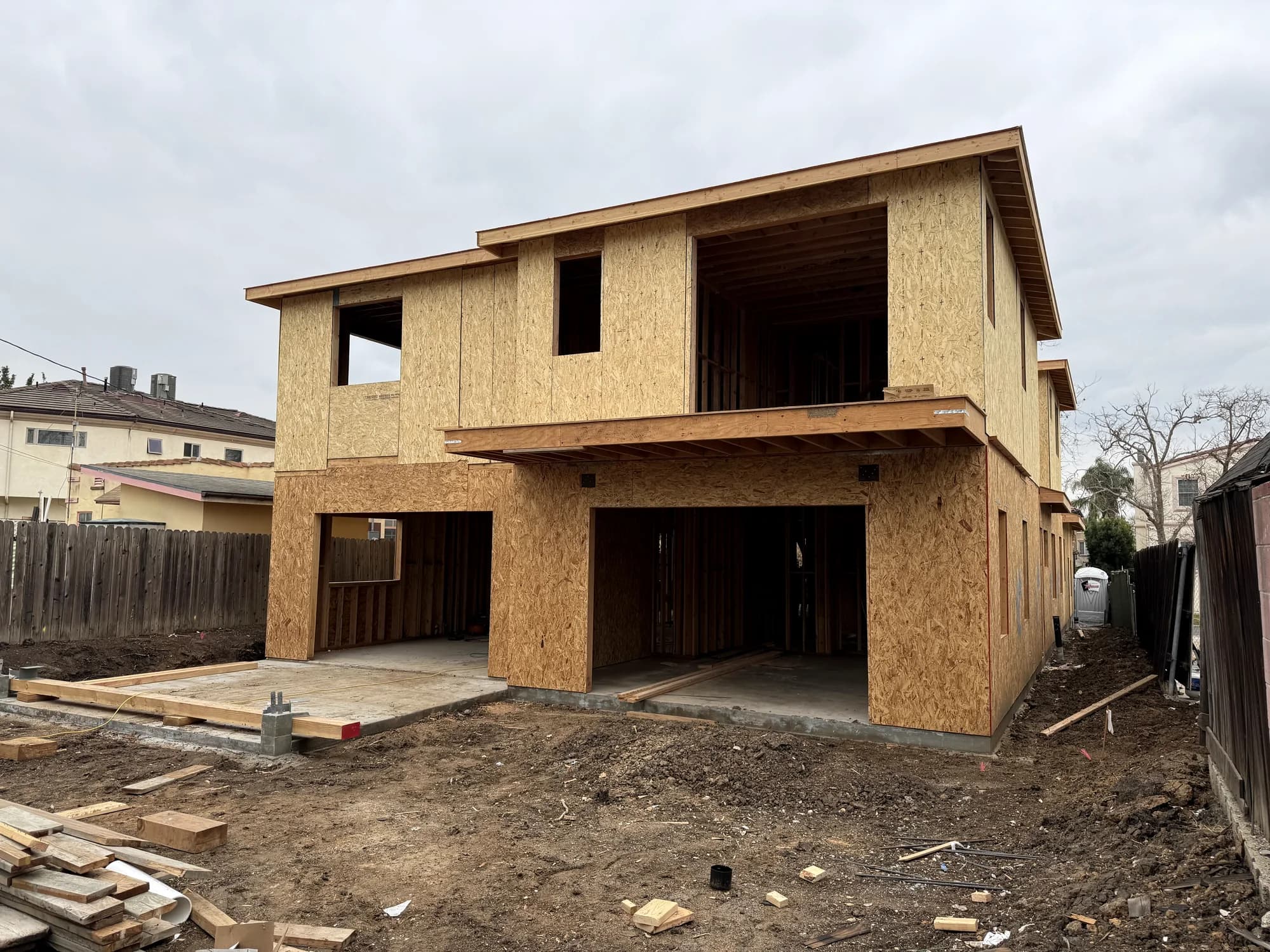 Two-storey frame and sheathing complete