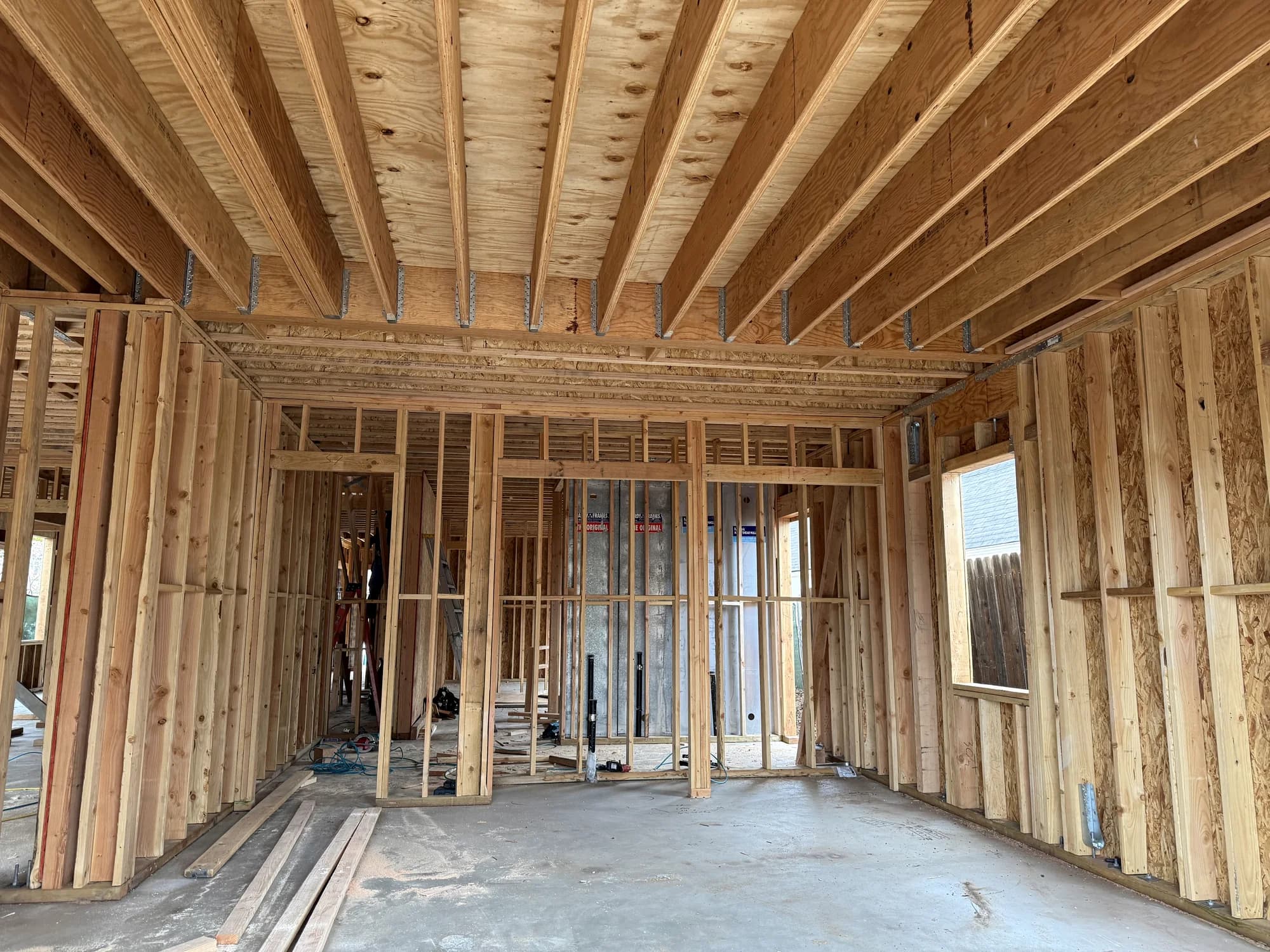 Open-plan interior in frame before drywall