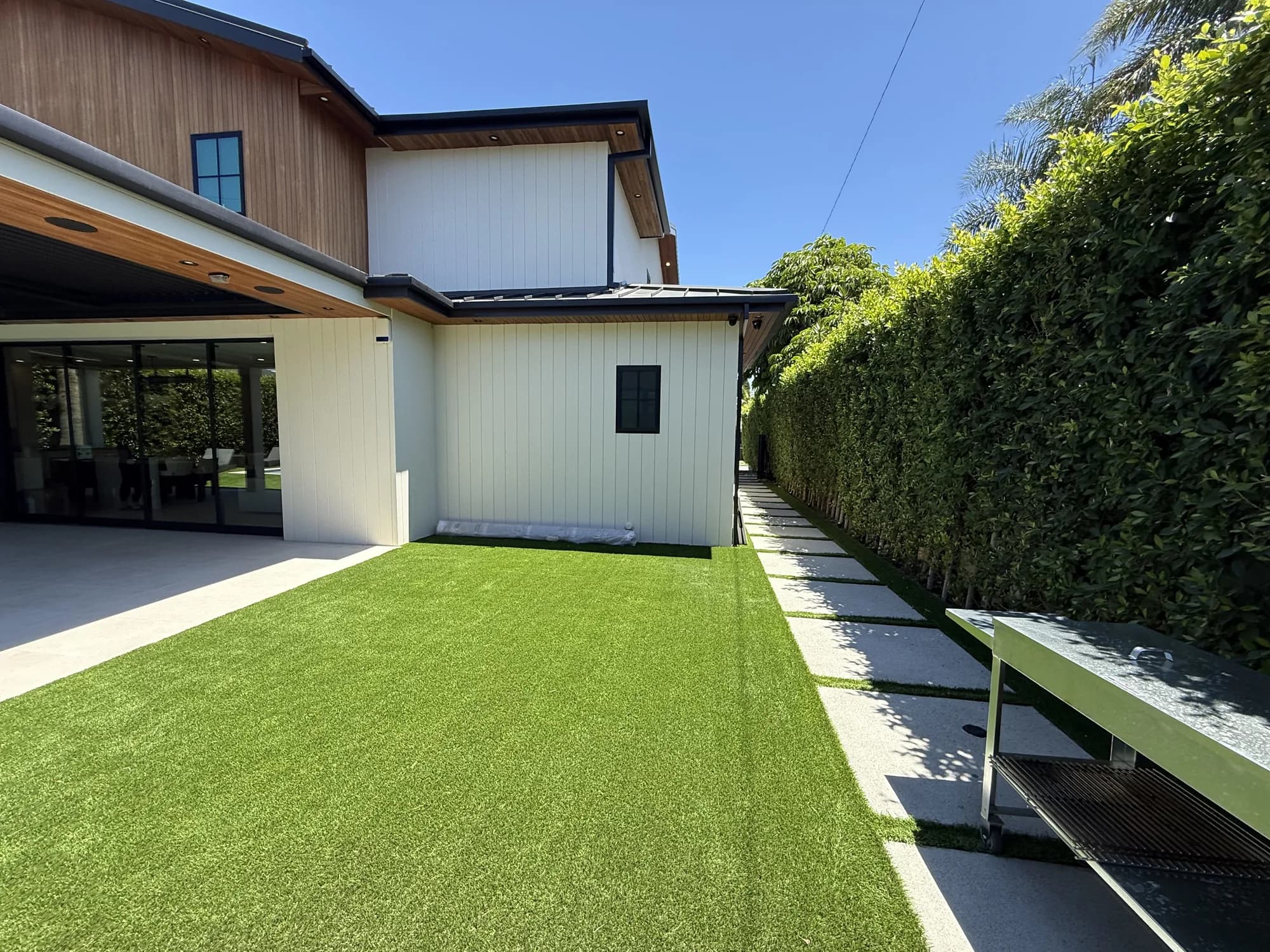 Rear elevation and landscaped yard on a completed APW Builders home